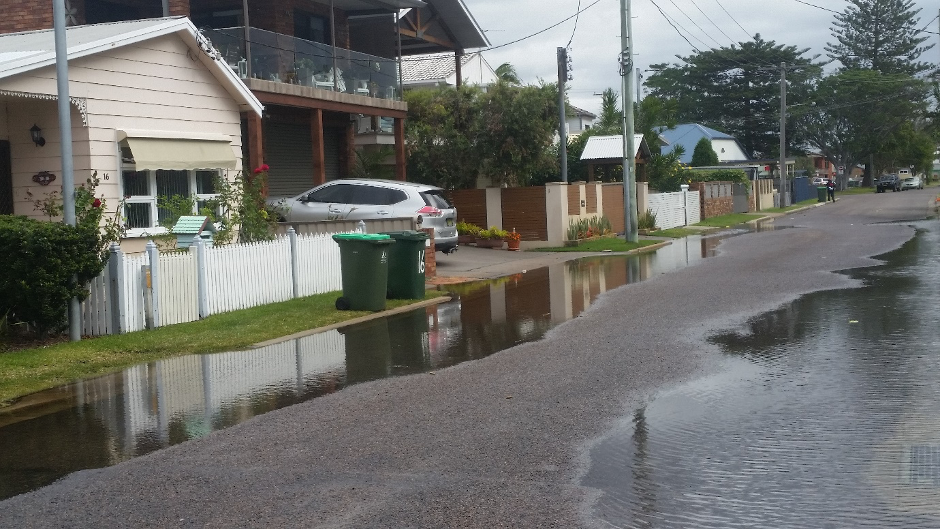 Image showing a street in Marks Point partly inundated by water